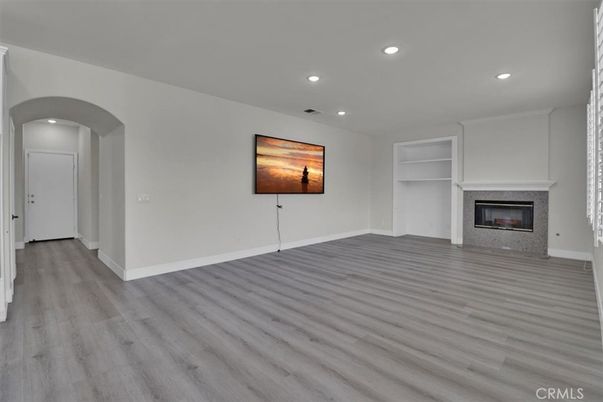 Empty room, Fireplace, Interior, Recessed Lighting, Wood Texture Flooring
