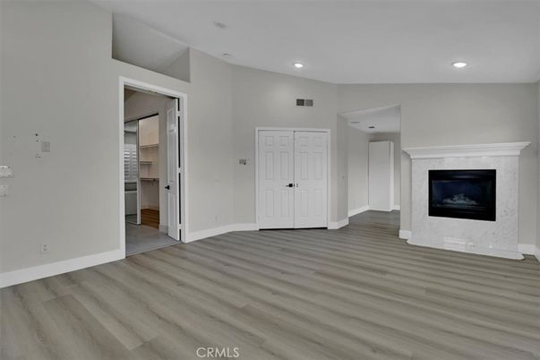 Empty room, Fireplace, Interior, Recessed Lighting, Wood Texture Flooring