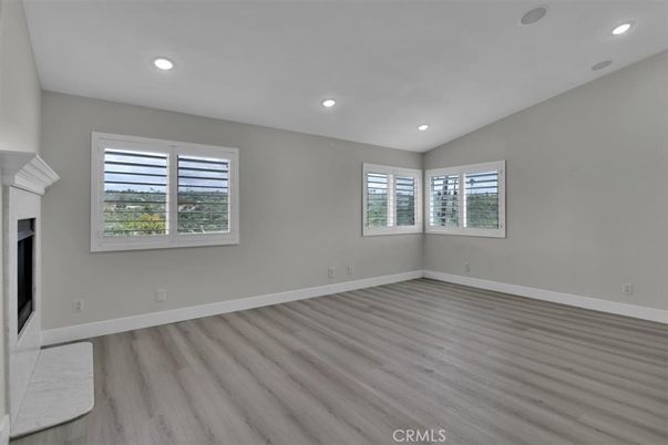 Empty room, Fireplace, Interior, Recessed Lighting, Wood Texture Flooring