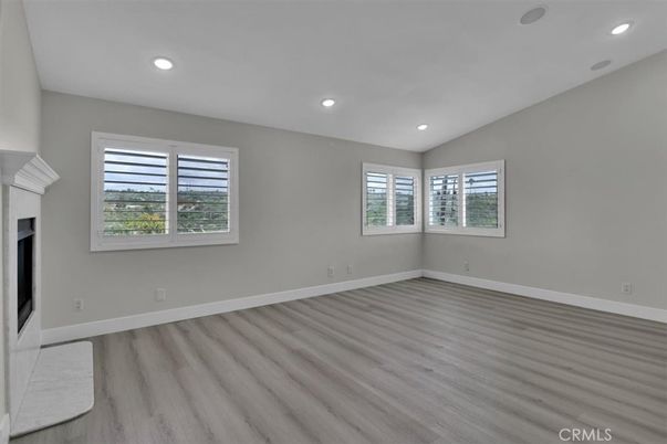 Empty room, Fireplace, Interior, Recessed Lighting, Wood Texture Flooring