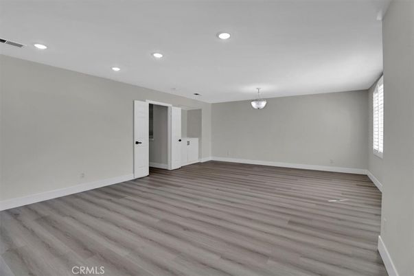 Chandelier, Empty room, Interior, Recessed Lighting, Wood Texture Flooring