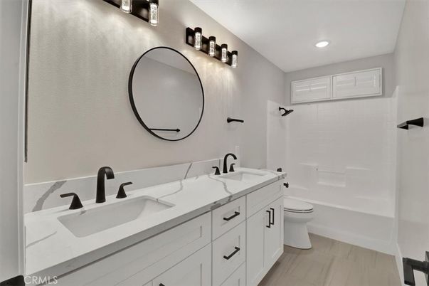Bathroom, Dual Sink Vanities, Interior, Recessed Lighting, Wood Texture Flooring