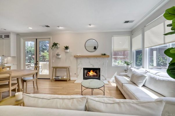 Dining room, Fireplace, Interior, Living room, Recessed Lighting, Wood Texture Flooring