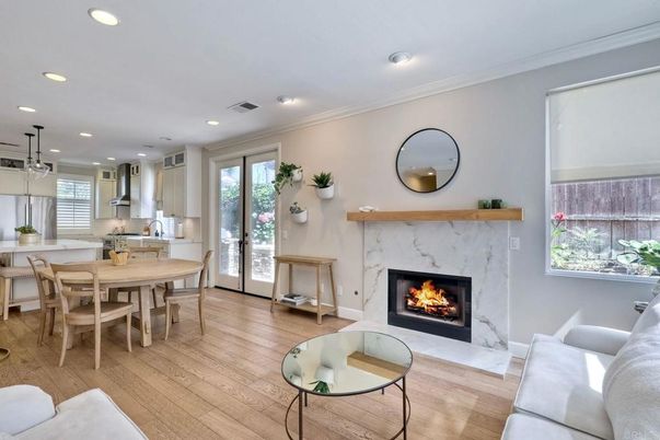 Dining room, Fireplace, Interior, Living room, Pendant Lights, Recessed Lighting, Wood Texture Flooring