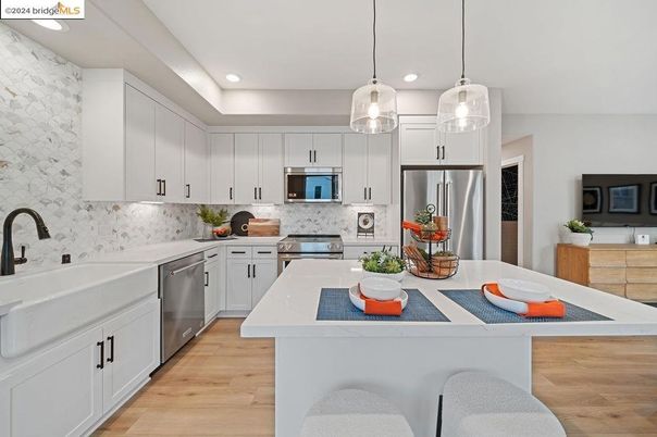 Interior, Kitchen, Pendant Lights, Recessed Lighting, Stainless Steel Appliances, Wood Texture Flooring