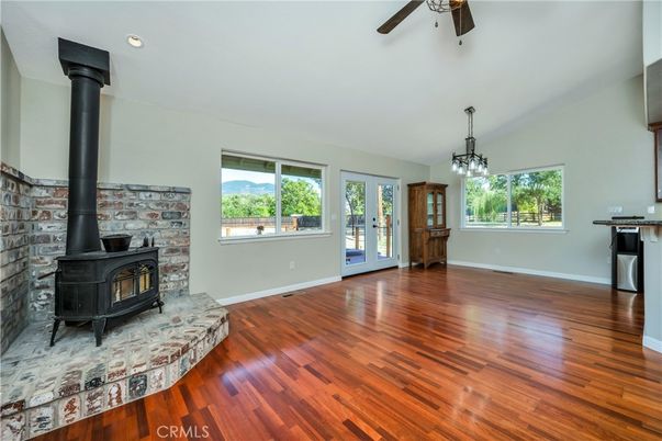 Empty room, Fireplace, Interior, Pendant Lights, Recessed Lighting, Wood Texture Flooring