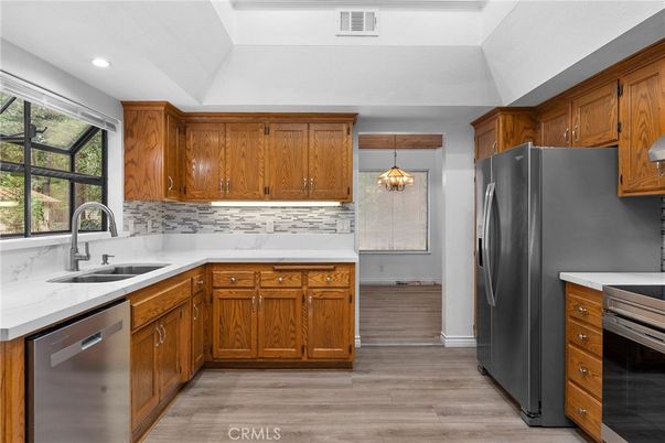 Interior, Kitchen, Pendant Lights, Recessed Lighting, Stainless Steel Appliances, Wood Texture Flooring
