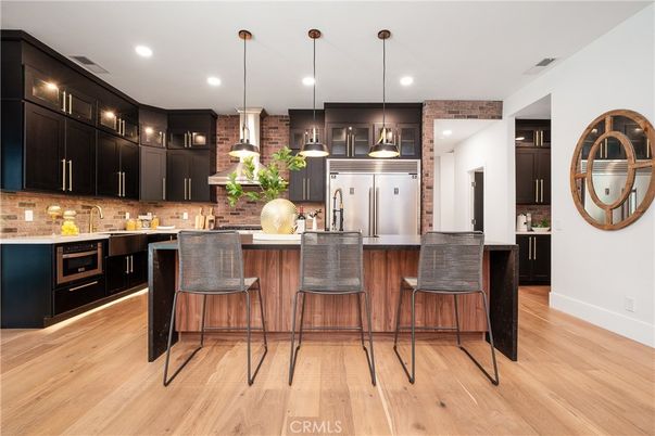 Interior, Kitchen, Pendant Lights, Recessed Lighting, Stainless Steel Appliances, Stone Walls, Wood Texture Flooring