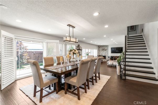 Dining room, Fireplace, Interior, Pendant Lights, Recessed Lighting, Wood Texture Flooring