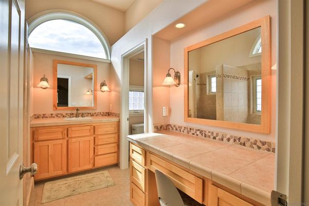 Bathroom, Dual Sink Vanities, Interior, Recessed Lighting, Tile Countertops