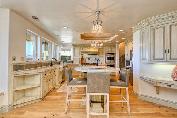 Chandelier, Dining room, Interior, Kitchen, Recessed Lighting, Stainless Steel Appliances, Wood Texture Flooring