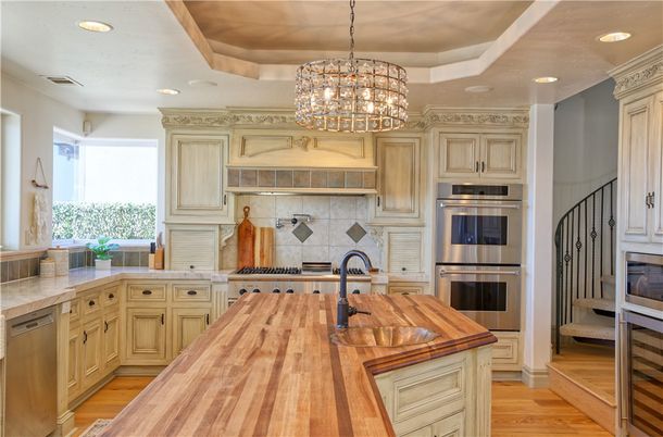 Chandelier, Interior, Kitchen, Recessed Lighting, Stainless Steel Appliances, Wood Texture Flooring