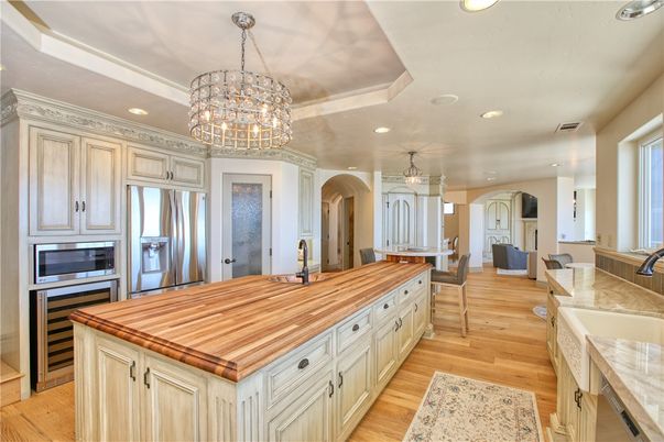 Chandelier, Interior, Kitchen, Pendant Lights, Recessed Lighting, Stainless Steel Appliances, Wood Texture Flooring