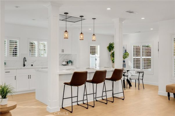 Interior, Kitchen, Marble Walls, Pendant Lights, Recessed Lighting, Wood Texture Flooring