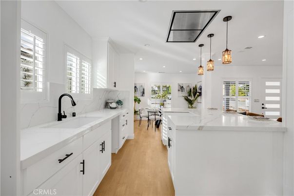 Dining room, Interior, Kitchen, Marble Walls, Pendant Lights, Recessed Lighting, Wood Texture Flooring