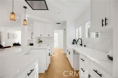Interior, Kitchen, Marble Walls, Pendant Lights, Recessed Lighting, Wood Texture Flooring