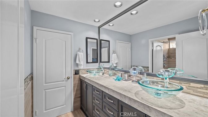 Bathroom, Dual Sink Vanities, Interior, Recessed Lighting, Wood Texture Flooring