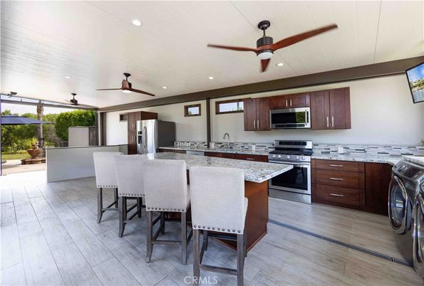 Interior, Kitchen, Recessed Lighting, Stainless Steel Appliances, Washer, Wood Texture Flooring