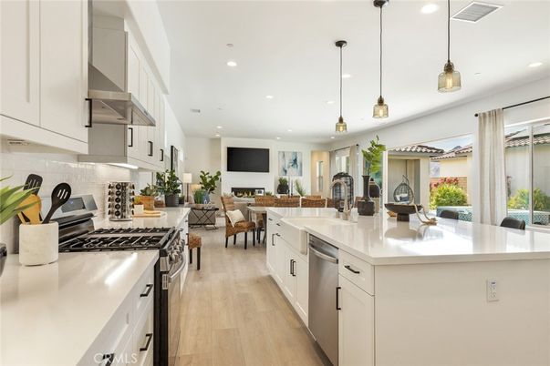Dining room, Interior, Kitchen, Living room, Pendant Lights, Recessed Lighting, Stainless Steel Appliances, Wood Texture Flooring