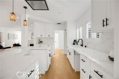 Interior, Kitchen, Marble Walls, Pendant Lights, Recessed Lighting, Wood Texture Flooring