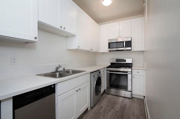 Interior, Kitchen, Stainless Steel Appliances, Washer, Wood Texture Flooring