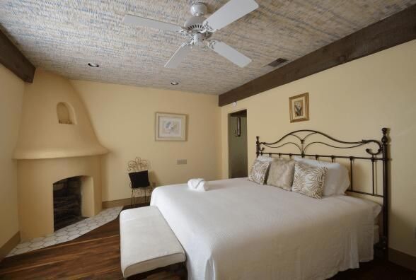 Bedroom, Fireplace, Interior, Recessed Lighting, Wood Texture Flooring
