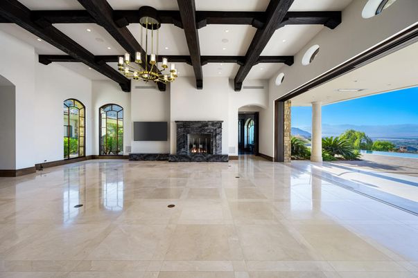 Chandelier, Empty room, Fireplace, Interior, Pendant Lights, Recessed Lighting, Wooden Beams