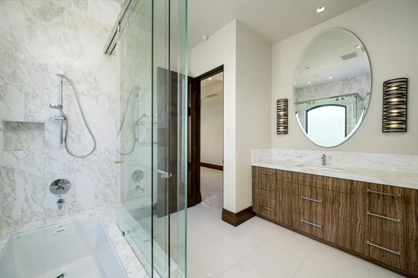 Bathroom, Dual Sink Vanities, Glass Shower, Interior, Marble Walls, Recessed Lighting