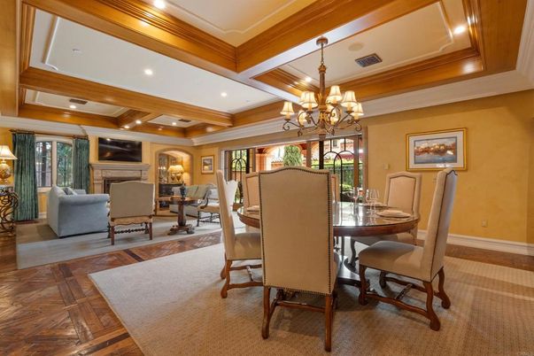 Chandelier, Dining room, Fireplace, Interior, Living room, Recessed Lighting, Wooden Beams, Wood Texture Flooring