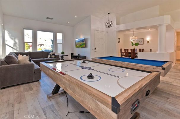 Billiard Table, Game Room, Interior, Living room, Pendant Lights, Recessed Lighting, Wood Texture Flooring