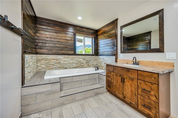 Bathroom, Dual Sink Vanities, Interior, Recessed Lighting, Wood Texture Flooring