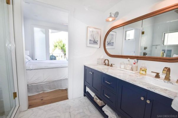 Bathroom, Bedroom, Dual Sink Vanities, Glass Shower, Interior, Marble, Wood Texture Flooring