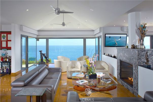 Fireplace, Interior, Living room, Recessed Lighting, Water, Wood Texture Flooring
