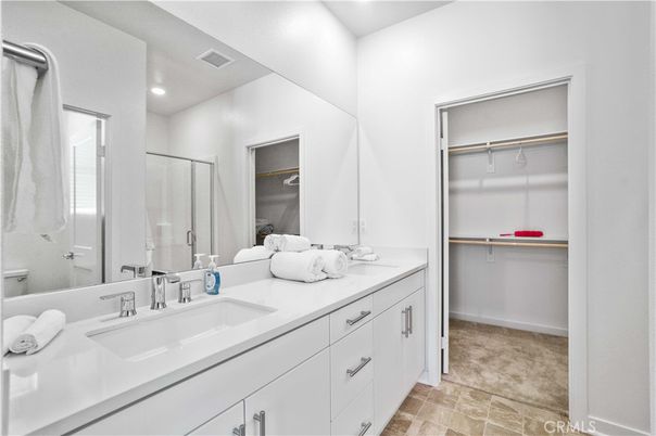 Bathroom, Dual Sink Vanities, Interior, Recessed Lighting, Walk-in Closets