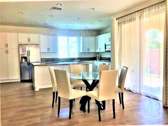 Dining room, Interior, Kitchen, Recessed Lighting, Stainless Steel Appliances, Wood Texture Flooring