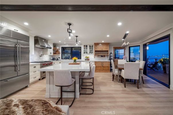 Chandelier, Dining room, Interior, Kitchen, Pendant Lights, Recessed Lighting, Stainless Steel Appliances, Wood Texture Flooring