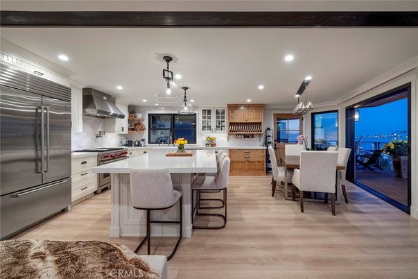 Chandelier, Dining room, Interior, Kitchen, Pendant Lights, Recessed Lighting, Stainless Steel Appliances, Wood Texture Flooring