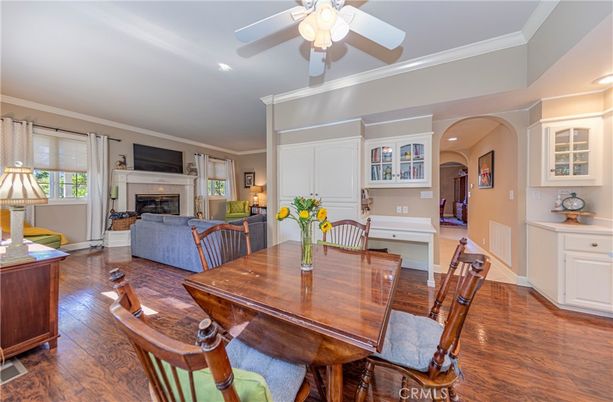 Dining room, Fireplace, Interior, Living room, Recessed Lighting, Wood Texture Flooring