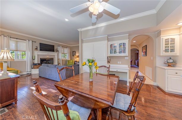 Dining room, Fireplace, Interior, Living room, Recessed Lighting, Wood Texture Flooring