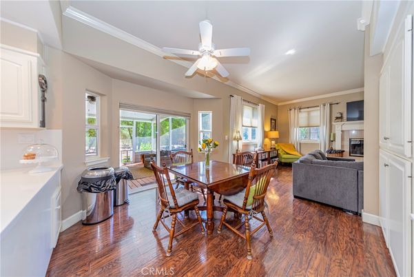 Dining room, Fireplace, Interior, Living room, Recessed Lighting, Wood Texture Flooring