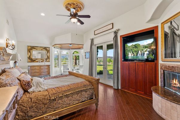 Bedroom, Fireplace, Interior, Recessed Lighting, Wood Texture Flooring
