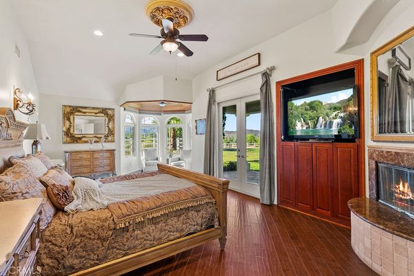 Bedroom, Fireplace, Interior, Recessed Lighting, Wood Texture Flooring
