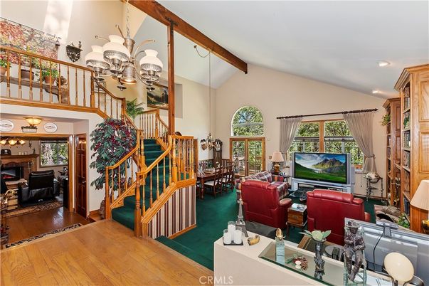 Chandelier, Dining room, Fireplace, Interior, Living room, Recessed Lighting, Wooden Beams, Wood Texture Flooring
