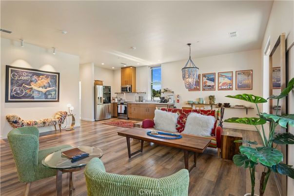 Dining room, Interior, Kitchen, Living room, Pendant Lights, Recessed Lighting, Stainless Steel Appliances, Wood Texture Flooring