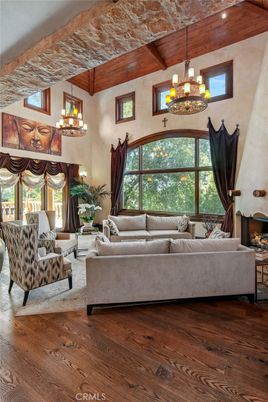 Chandelier, Fireplace, Interior, Living room, Recessed Lighting, Wooden Beams, Wood Texture Flooring