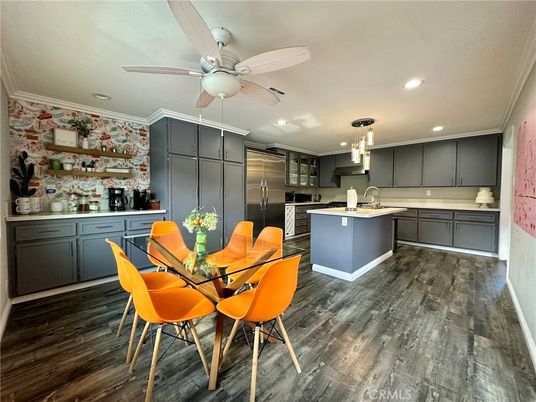 Dining room, Interior, Kitchen, Pendant Lights, Recessed Lighting, Stainless Steel Appliances, Wood Texture Flooring