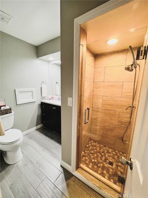 Bathroom, Glass Shower, Interior, Recessed Lighting, Wood Texture Flooring