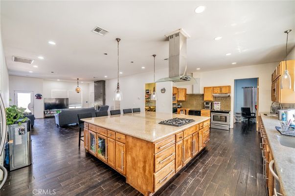 Dining room, Interior, Kitchen, Living room, Pendant Lights, Recessed Lighting, Stainless Steel Appliances, Wood Texture Flooring