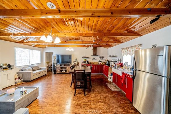 Dining room, Interior, Kitchen, Living room, Pendant Lights, Stainless Steel Appliances, Wooden Beams, Wooden Ceilings, Wood Texture Flooring