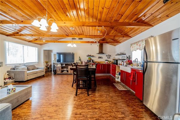 Dining room, Interior, Kitchen, Living room, Pendant Lights, Stainless Steel Appliances, Wooden Beams, Wooden Ceilings, Wood Texture Flooring
